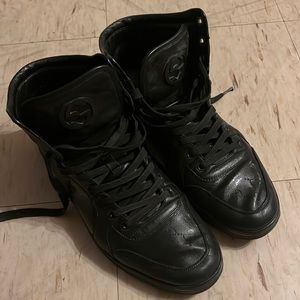 I’m selling used and restored black Gucci high top Ace GG sneakers.